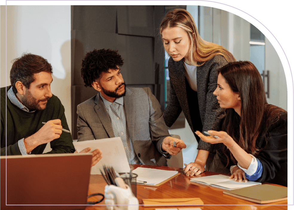 Business team discussing workforce scheduling challenges during an office meeting