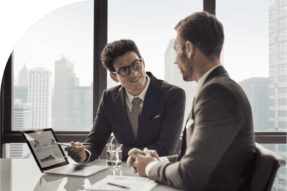 Professionals discussing realized value and investment performance