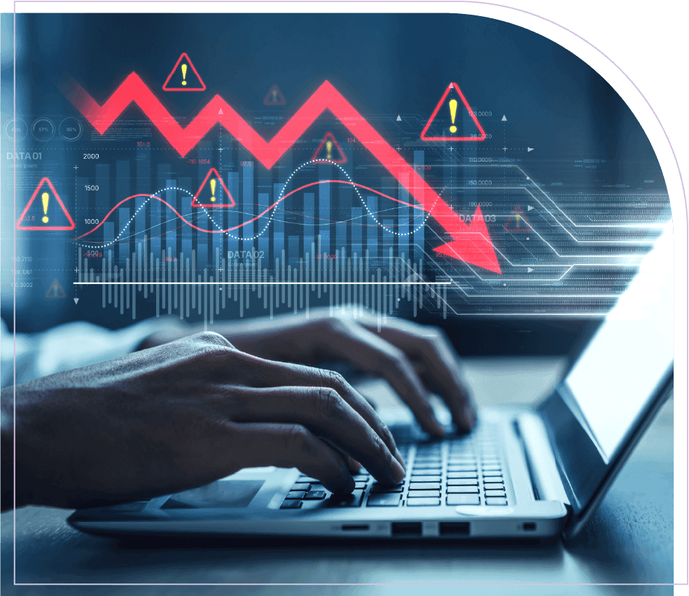 PMO professional working on a laptop with warning icons and a declining performance chart