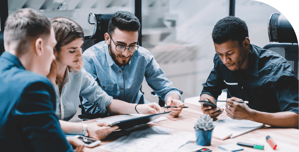 A project team discussing benefit targets and portfolio value realization during a meeting
