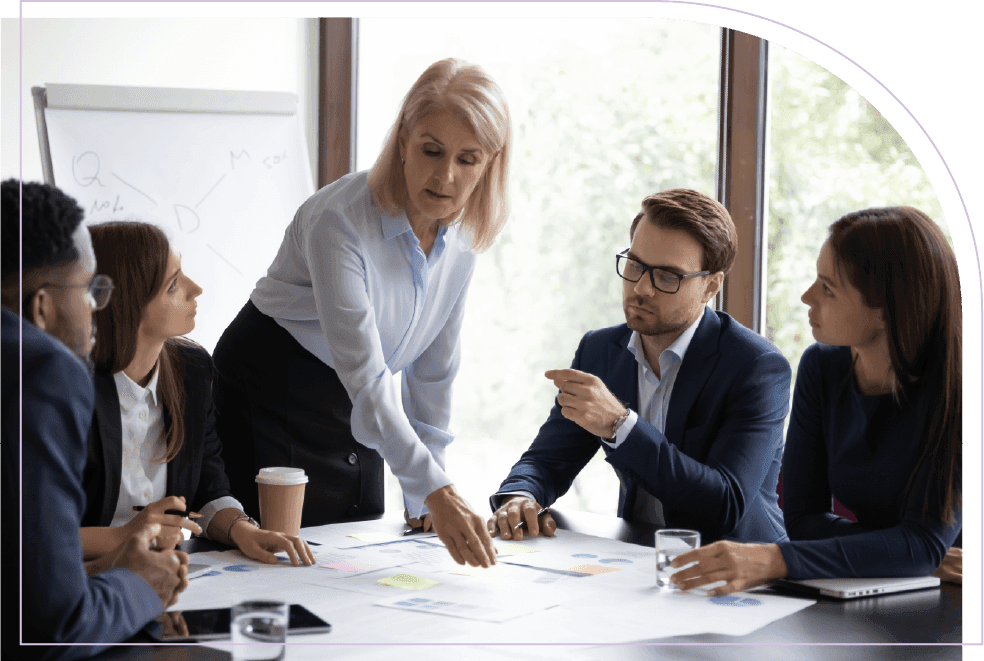 Business team discussing workforce scheduling and allocation during a meeting