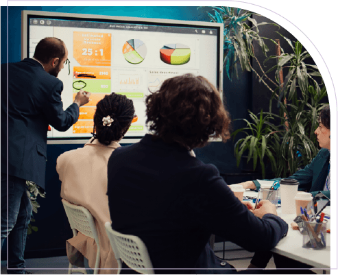 Team reviewing financial scenario analytics on a business dashboard
