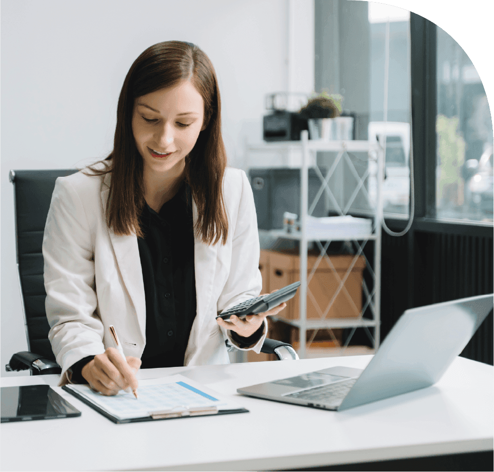 Professional calculating project revenue and reviewing financial records