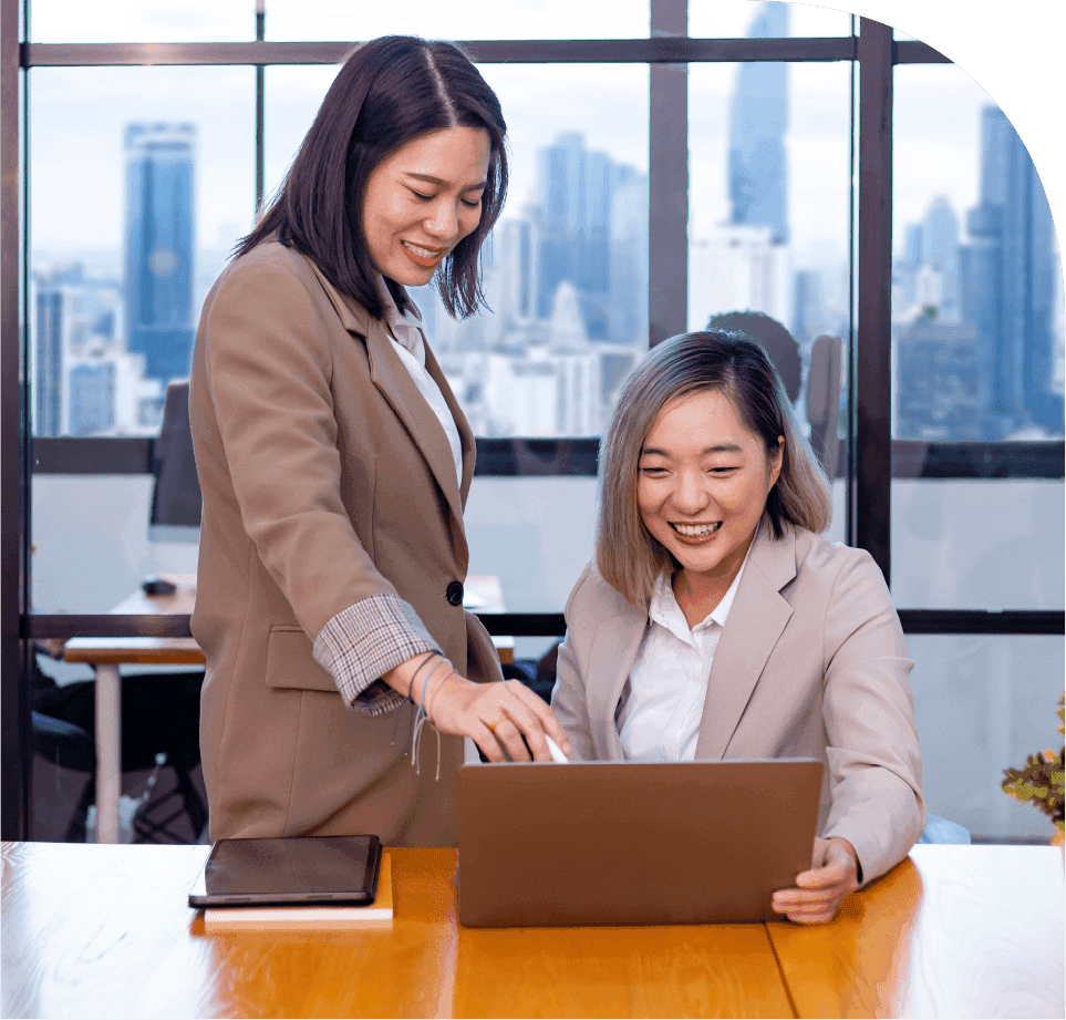 Business professionals reviewing resource ROI insights on a laptop