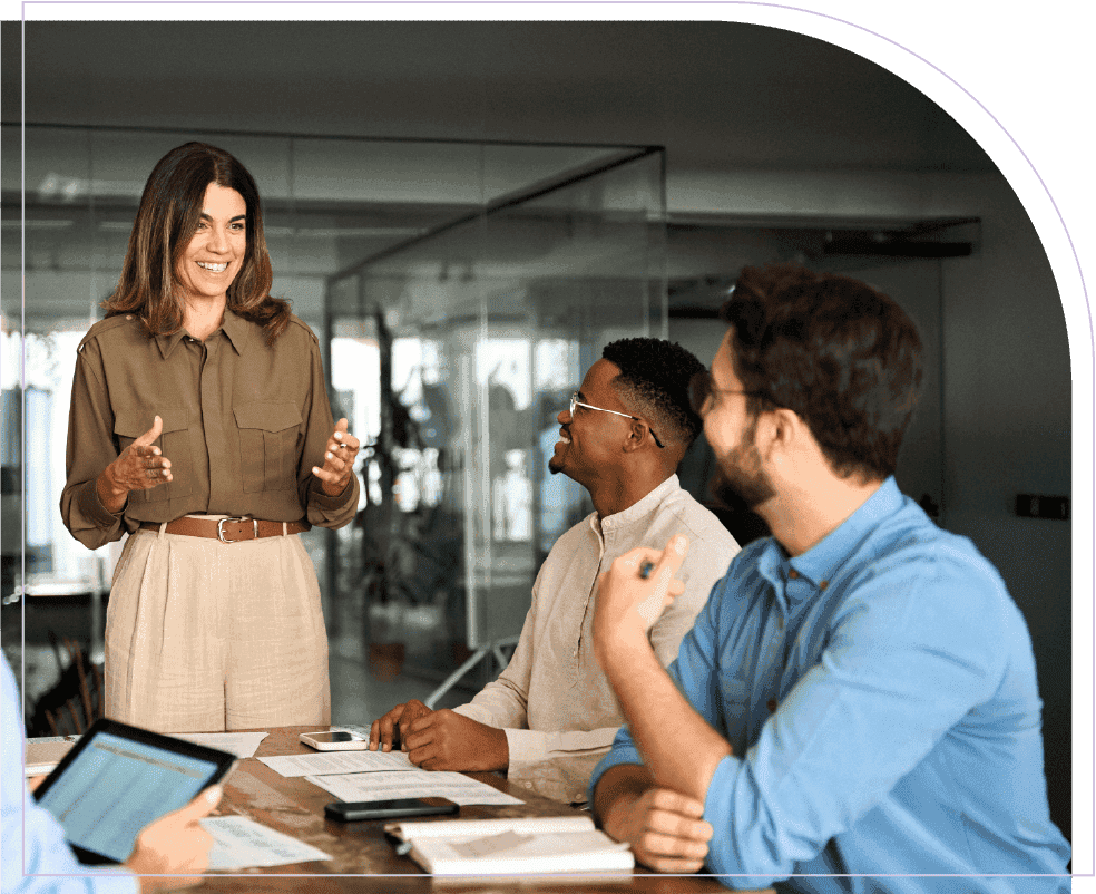 Business team discussing SAVIOM’s resource management solutions