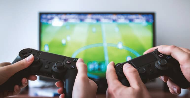 Image showing couple of people playing in a playstation.