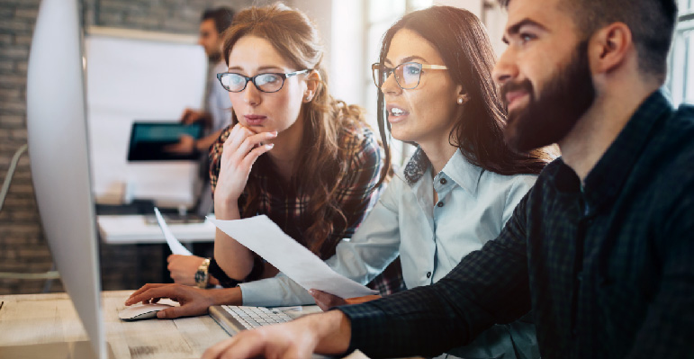 Professionals utilizing the employee scheduling software to assign the best-fit resources to tasks