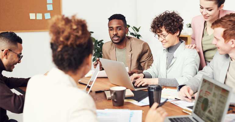 The team is discussing how to utilize employee scheduling software to boost productivity